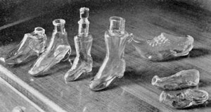 Illustration II: Made Originally as Perfume Bottles: Shaped like Dutch wooden sabots and high shoes, they are much smaller than are usually to be found. Illustration II: Made Originally as Perfume Bottles: Shaped like Dutch wooden sabots and high shoes, they are much smaller than are usually to be found.