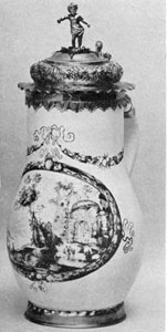 Illustration II: Fayence Jug by Shaper: An example of "Schwarzlot" painting done circa 5665, the piece has copper-gilt mountings. Illustration II: Fayence Jug by Shaper: An example of "Schwarzlot" painting done circa 5665, the piece has copper-gilt mountings.