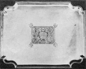 2. Superb example of Augustine Courtauld's achievement of fine form by beautiful proportions and bold, clear outline. A tray dating 1721-24. Width, 211/2 in. Weight, 125 ounces. Sold in 1945 for $6,800. 2. Superb example of Augustine Courtauld's achievement of fine form by beautiful proportions and bold, clear outline. A tray dating 1721-24. Width, 211/2 in. Weight, 125 ounces. Sold in 1945 for $6,800.