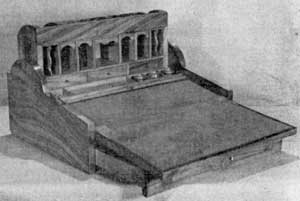 Made in China of Camphor Wood: This gentleman's tambour desk was probably copied from one of English origin. The removable center section contains drawers, pigeonholes, a pen tray and compartments. Made in China of Camphor Wood: This gentleman's tambour desk was probably copied from one of English origin. The removable center section contains drawers, pigeonholes, a pen tray and compartments.