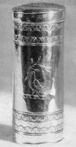 Illustration XII: A Nutmeg Grater: By John Coburn, Boston, 1725-1803. With tight fitting cover and containing both grater and nutmeg, this was made to be carried in the owner's pocket. Illustration XII: A Nutmeg Grater: By John Coburn, Boston, 1725-1803. With tight fitting cover and containing both grater and nutmeg, this was made to be carried in the owner's pocket.