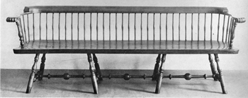 A Philadelphia Windsor Bench: This is unusual in that it was made principally of curly maple. This carving of the knuckle arms and turnings of the stretchers are typical of the work of Pennsylvania Windsor chairmakers from 1760 to 1780. A Philadelphia Windsor Bench: This is unusual in that it was made principally of curly maple. This carving of the knuckle arms and turnings of the stretchers are typical of the work of Pennsylvania Windsor chairmakers from 1760 to 1780.