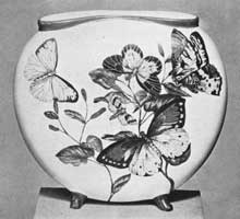 Illustration I: Rookwood Vase Dated 1882: Butterflies are the motif of this hand-painted piece. It is of the period when the fashion in Cincinnati was to decorate individual pieces made at the pottery. Illustration I: Rookwood Vase Dated 1882: Butterflies are the motif of this hand-painted piece. It is of the period when the fashion in Cincinnati was to decorate individual pieces made at the pottery.