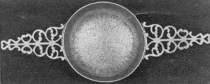 Illustration III: Strainer Dated 1765: It was made by Jonathan Clarke, 1705-1770, who worked first in Newport and later in Providence. It has a perforated inscription reading, "Jabez Bowen, Providence, January 1765." Illustration III: Strainer Dated 1765: It was made by Jonathan Clarke, 1705-1770, who worked first in Newport and later in Providence. It has a perforated inscription reading, "Jabez Bowen, Providence, January 1765."