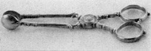 Illustration XI: Sugar Tongs: Made by George Fielding, New York circa 1731, these open and shut like a pair of scissors, which was an unusual design for such pieces. Illustration XI: Sugar Tongs: Made by George Fielding, New York circa 1731, these open and shut like a pair of scissors, which was an unusual design for such pieces.