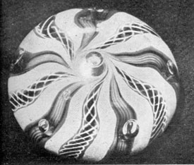 A Venetian Example: In this crown type the decorative design was obtained by use of two kinds of spiral thread glass rods alternating with ribbon-stripe bands, as well as regularly placed air bubbles. A Venetian Example: In this crown type the decorative design was obtained by use of two kinds of spiral thread glass rods alternating with ribbon-stripe bands, as well as regularly placed air bubbles.