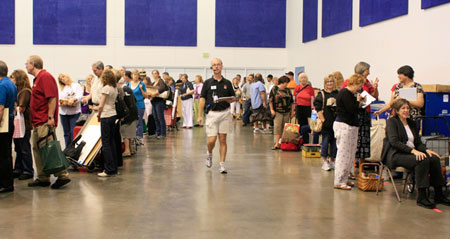 After receiving their table-specific tickets, guests line up and anxiously wait to hear what the appraisers have to say about their items. After receiving their table-specific tickets, guests line up anxiously waiting to hear what the appraisers have to say about their items.