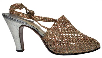 Italian designer Ferragamo is one of the most famous names in shoes. This cellophane and kid shoe is from 1938. Italian designer Ferragamo is one of the most famous names in shoes. This cellophane and kid shoe is from 1938.