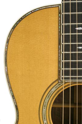 Decorative details were used sparingly on early Martins. This 00-45 from 1927 features abalone inlay around the guitar's outside edge and sound hole. Decorative details were used sparingly on early Martins. This 00-45 from 1927 features abalone inlay around the guitar's outside edge and sound hole.