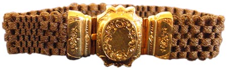 This Victorian hairwork bracelet featured a weave that stretched to fit the wearer. The clasp is neo-Rococo. This Victorian hairwork bracelet featured a weave that stretched to fit the wearer. The clasp is neo-Rococo.