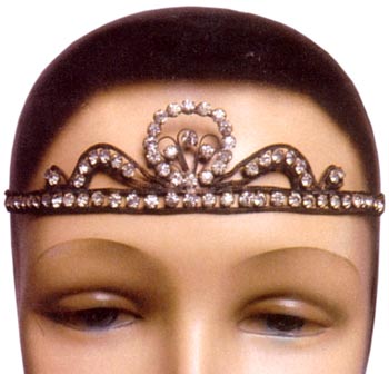 Headache bands, such as this Art Deco, rhinestone tiara from the 1920s, were perfect for a night out in a speakeasy. Headache bands, such as this Art Deco, rhinestone tiara from the 1920s, were perfect for night out in a speakeasy.