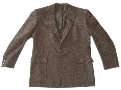 The killer rockabilly jacket was made of wool, featured a notched collar and padded shoulders, and was dotted with silver flecks.