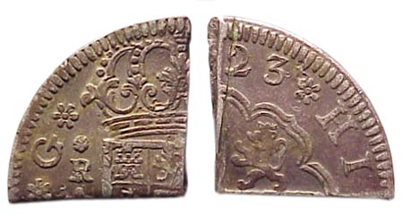 In the tobacco colonies, people would cut coins such as this 1723 Pistareen into quarters or halves to make small change. The 1723 Pistareen, minted in Segovia Spain chopped to make quarters.