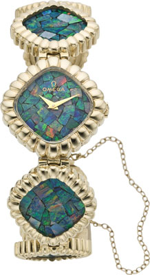 This Omega from 1975 was as much a bracelet as a wristwatch. It boasted 14K yellow gold and opals throughout. Omega