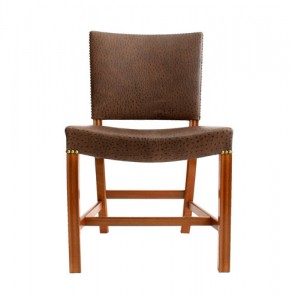 Cabinetmaker R. Rasmussen made this example of Kaare Klint's famous Barcelona Chair, which here features mahogany legs and ostrich leather on the seat and back.
