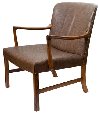 Mahogany and ostrich leather give this Ole Wanscher chair, produced by cabinetmaker A.J. Iversen, its casual-yet-refined appearance. I think this is an Ole Wanscher chair by cabinetmaker AJ Iversen