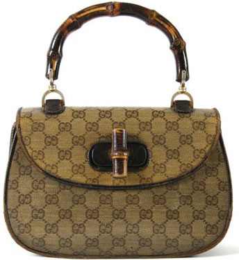Gucci is famous for its bamboo-handled bags and logo print. This one, from the 1960s, is stamped Gucci. Private Collection, New York, New York. A Gucci Brown Logo Print Bag, 1960s, in a plastic coated GG logo fabric, with bamboo handle and closure, GG logo at front, fully lined. Stamped: Gucci. Property from a Distinguished Park Avenue Private Collection, New York, New York.