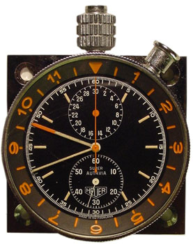 This rare Super Autavia dashboard chronograph has a Valjoux 76 movement, a dial with baton markers for hours, and a chromium-coated, low-profile case. Early Super Autavia (SAT2): First execution of the Super Autavia, with Valjoux 76 movement; dial has baton markers for hours; case is chromium coated, low-profile; bezel is snap-on, coin-edge, with red markings.
