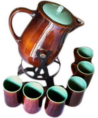 Introduced in 1952, Village Green was designed by Charles Murphy and produced until Red Wing Potteries closed in 1967. Introduced in 1952, Village Green was designed by Charles Murphy and produced until Red Wing Potteries closed in 1967.