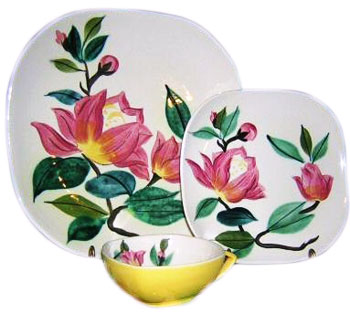 Charles Murphy was the designer of these plates and cup in the Blossom Time pattern, which was produced from 1950 to 1955 and featured a Concord shape. Charles Murphy was the designer of these plates and cup in the Blossom Time pattern, which was produced from 1950 to 1955 and featured a Concord shape.