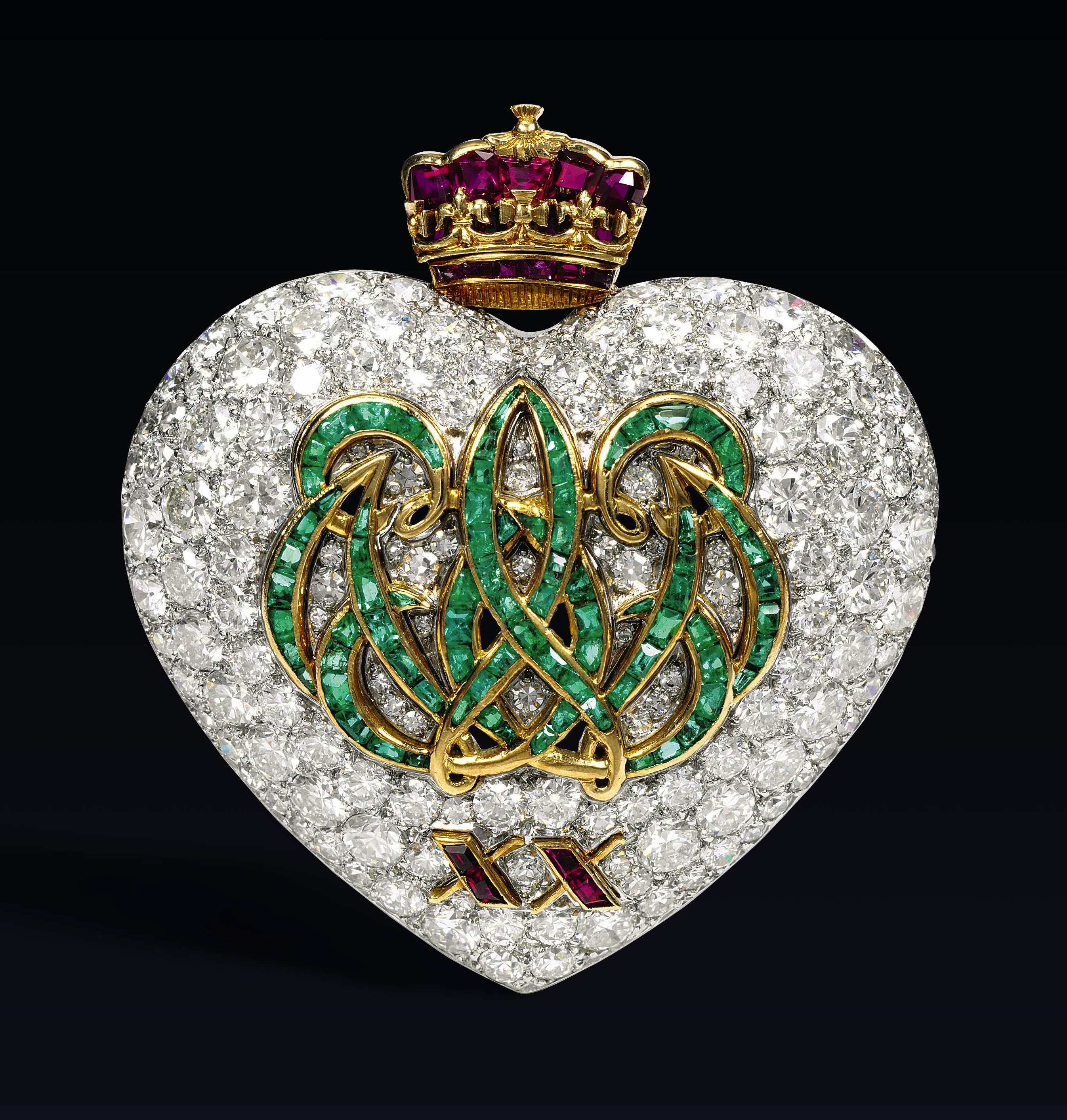 In 1957, Cartier created this ruby-crowned 20th-anniversary brooch for the Duchess. Like many of her pieces, it was a gift from her husband, the Duke. In 1957, Cartier created this ruby-crowned 20th-anniversary brooch for the Duchess. Like many of her pieces, it was a gift from her husband, the Duke.