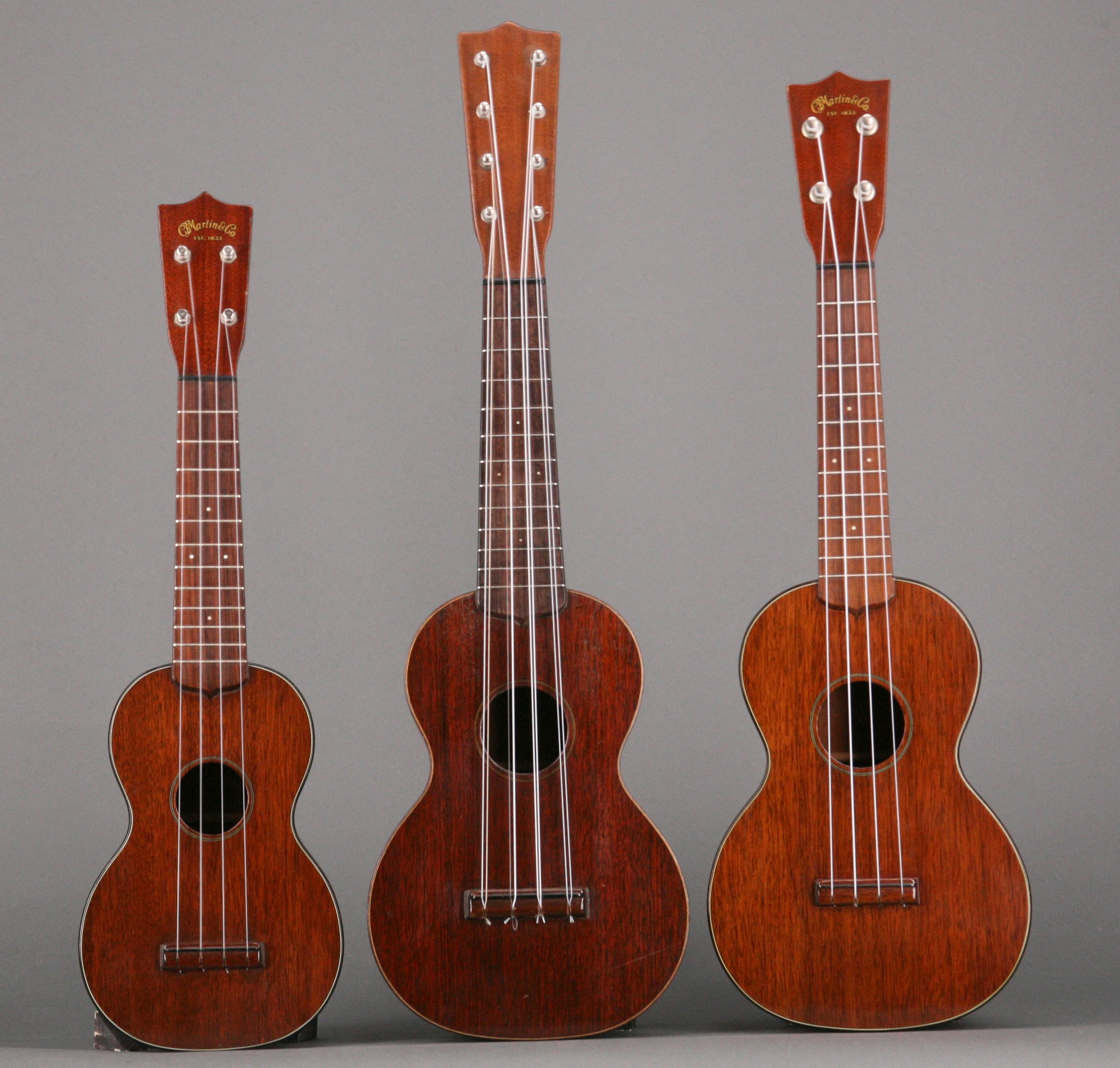 Shown here are three Martin mahogany ukes: On the left is a Style 1 soprano from the late 1940s; in the middle is a Style 1 taropatch from the mid-1920s; and on the right is Martin's concert model, also from the late ’40s. Shown here are three Martin mahogany ukes: On the left is a Style 1 soprano from the late 1940s; in the middle is a Style 1 taropatch from the mid-1920s; and on the right is Martin's concert model, also from the late ’40s.