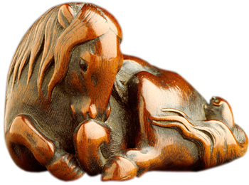 A wooden horse from the early 1800s, carved by Kano Tomokazu, has inlaid eyes.
