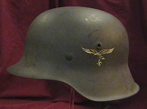 Helmet 6. Nazi military pieces, such as this Luftwaffe M-42 helmet, are popular among World War II history collectors.