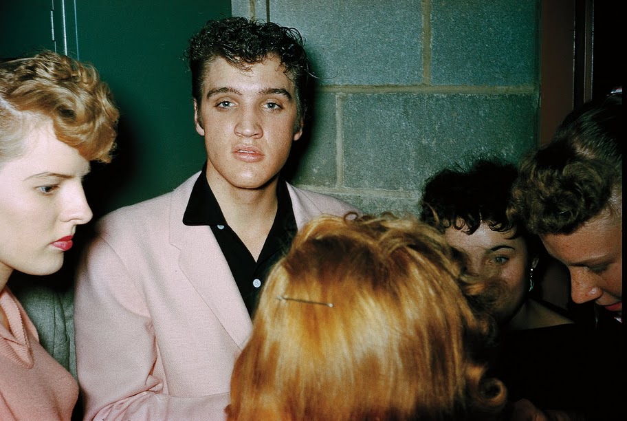 Elvis Presley, St. Michael's Hall Elvis Presley signing autographs backstage at St. Michael's Hall in Broadview Heights, October 20, 1955.