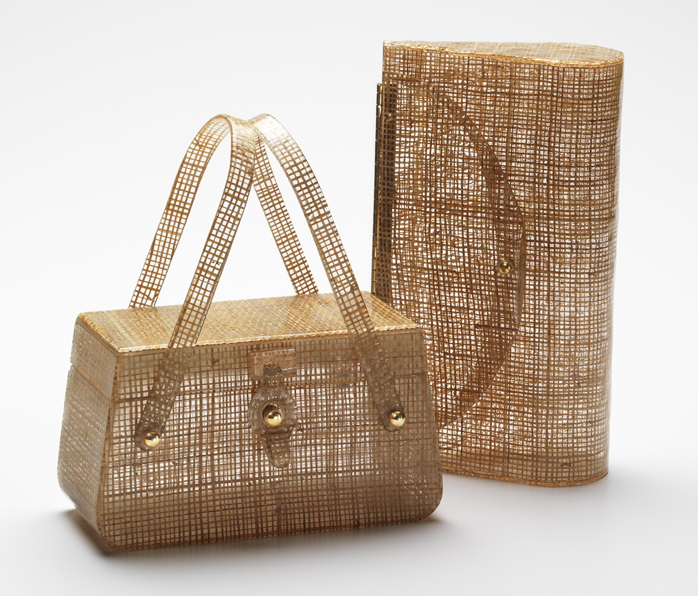 Foster and Wilardy Basket Weaves Basket-weave fabric was a favorite Lucite laminate. The bag on the left is by Charles Foster, the clutch on the right is from Wilardy.