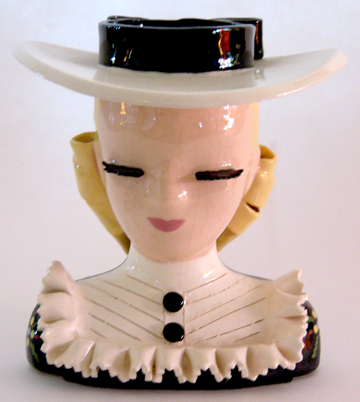 Mary Lou "Mary Lou" is a classic Betty Lou Nichols head vase, with thick eyelashes and lots of breakable edges.