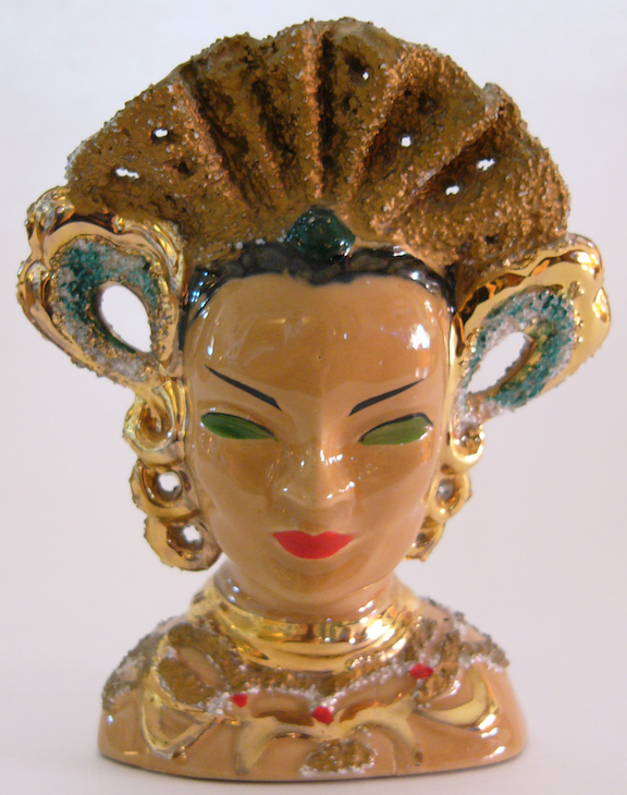 Ucagco Crop By the 1950s, head vases such as this one designed by Kathi Urbach, were being imported from Japan by companies like Ucagco.