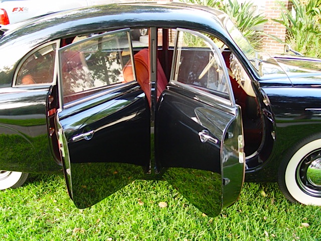 TatraDoors A suicide door in the front and a conventional door in the rear means both open off the car's central pillar.