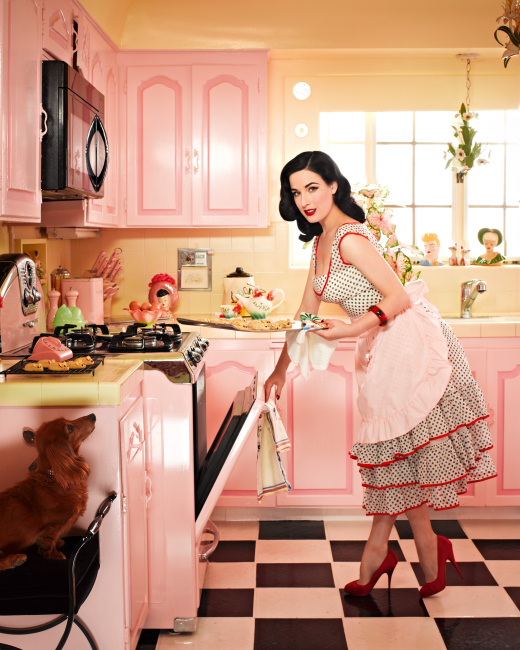 dita_kitchen In her kitchen lined with head vases, Von Teese serves cookies and tea in a vintage teapot. Photo by Douglas Friedman.