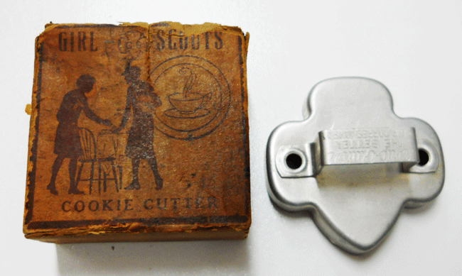 GS-cookie-cutter An official Girl Scout cookie-cutter box from 1932 seen alongside a trefoil-shaped cutter from 1949. Courtesy Ellen DeMaio.