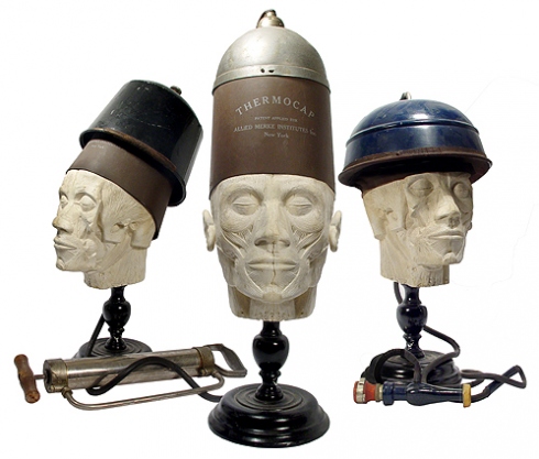 baldness Several early mechanical devices intended to cure balding. Via Radio-Guy.com.