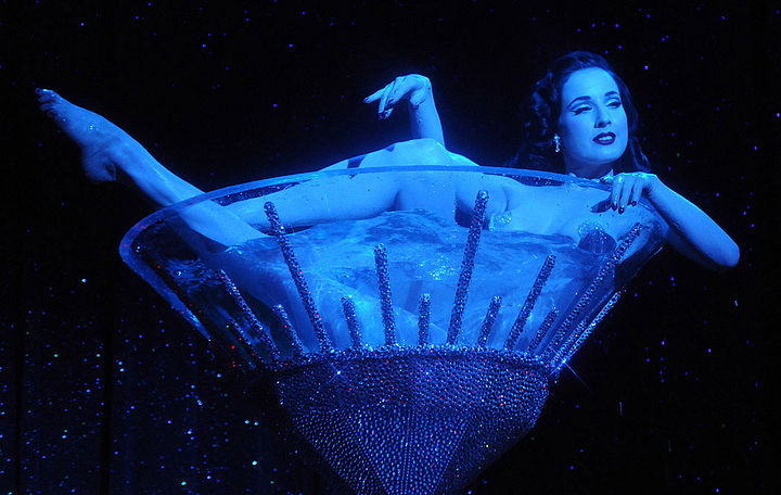 stripstriphooray Von Teese takes a champagne bath in her "Burlesque: Strip Strip Hooray!" tour stop in Las Vegas. Photo by Scott Harrison, via Dita.net.