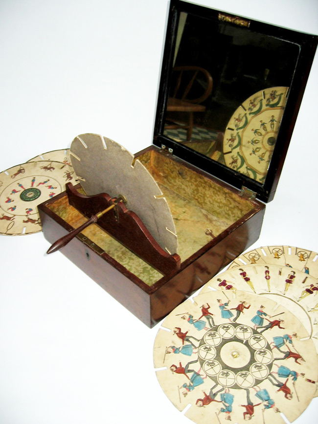 phenakistoscope To see the images on the discs designed for this English Phenakistoscope, c. 1835, viewers would look through the slots in the discs and see the animations in the mirror.