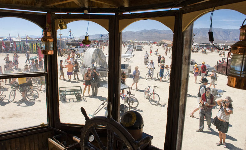 windshield Looking out the windshield of the Neverwas Haul onto the playa at Burning Man. Photo by Andy Pischalnikoff.