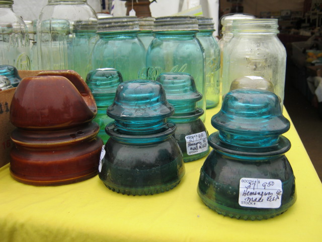 glass Glass insulators and Ball jars at Brimfield. Photo by Ben Marks.