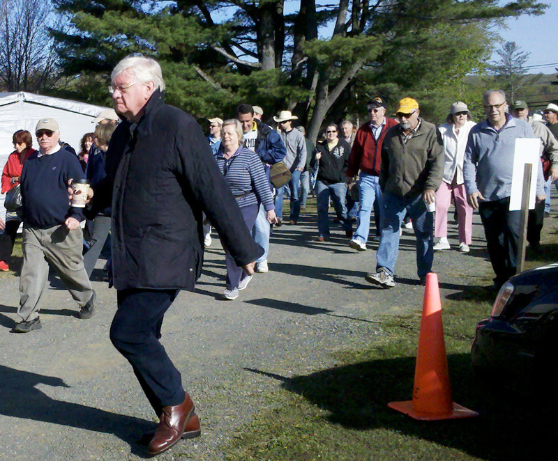 crowd As soon as the gates open at the J&J field, the oldest show at Brimfield, the crowd rushes in. Photo by Maureen Stanton.