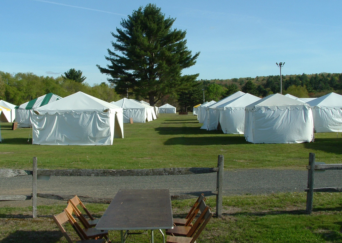whitetents The prestigious J&J field at the Brimfield antique fair, before the dealers are allowed to set up there. Photo by Maureen Stanton.