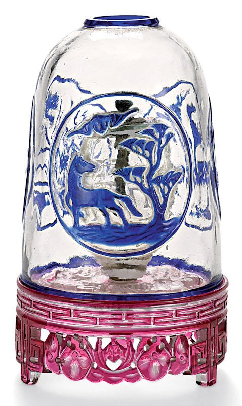 peking glass An antique opium lamp made from Peking glass.