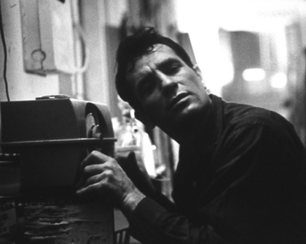 87120.max1024 Jack Kerouac listens to himself read on the radio in 1959.