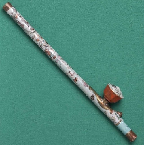 porcelain pipe A rare opium pipe with a porcelain stem. Only a handful of these pipes survived anti-opium eradication campaigns.