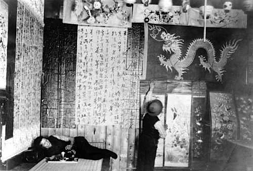 opium scrolls Opium smoking in Denver, Colorado, in the late 19th century. Walls of opium dens were usually covered to prevent drafts that could cause the lamp to flicker.