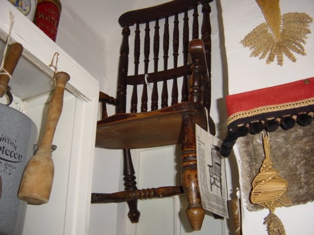 Busby Chair This 17th century chair that once belonged to a murderer has been hung up out of reach at the Thirsk Museum in England, as it is believed to put a death jinx on sitters. Photo by John R. Bacon at soapboxcorner.blogspot.com.