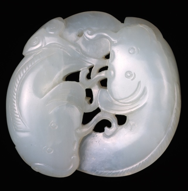 Catfish2 This pendant composed of two nephrite catfish was probably a wedding gift since the fish combined with the fungus that one of the fish is biting means "may your wishes come true year after year."