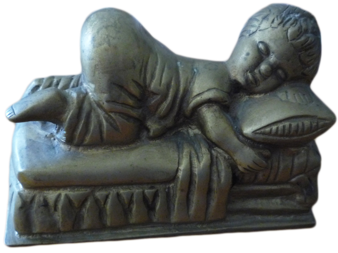 bronzechild This 1891 bronze funerary figurine of a sleeping child is said to have come from a mausoleum haunted by the apparition of a little boy who drowned.