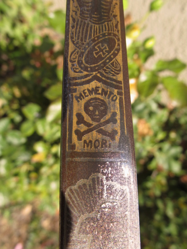 mementomori The original owner of this Masonic sword supposedly took his own life with it in 1893, hence, it has a "haunted history."
